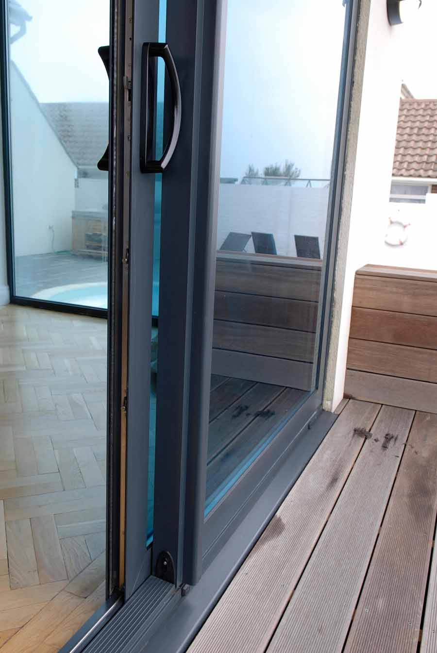 Aluminium sliding door looking onto garden