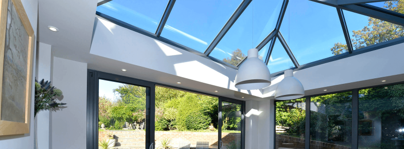 Interior view of an aluminium conservatory with a glazed roof 