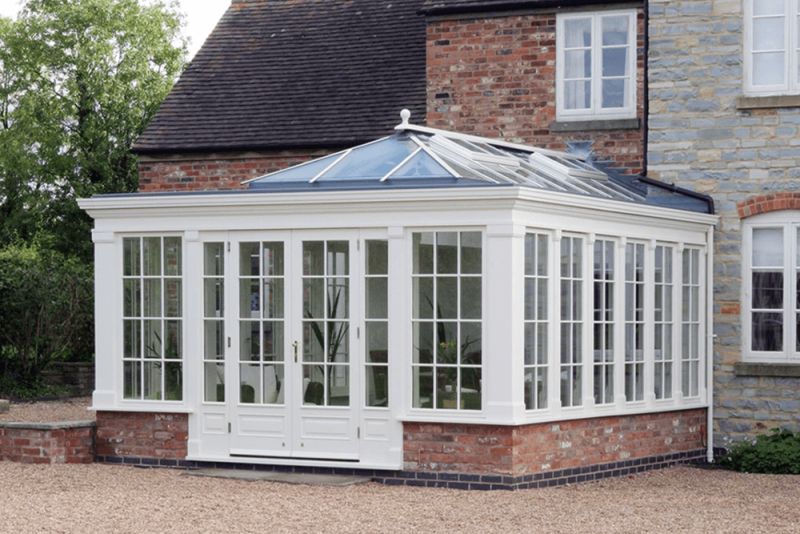 Timber framed conservatory painted white 